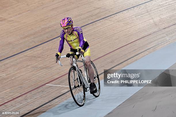 French centenarian cyclist Robert Marchand rides in his attempt to set a one-hour track cycling World record in the over-105 age group, at the...