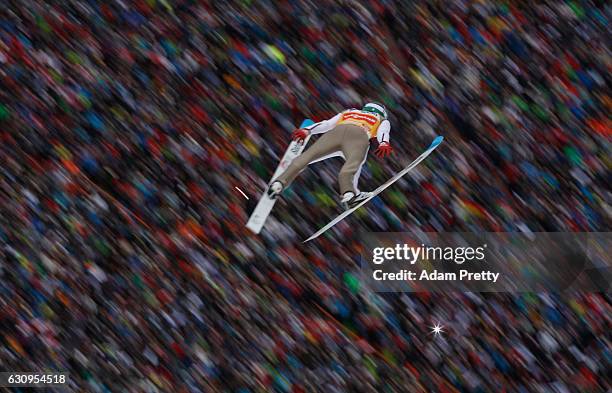 Daniel Andre Tande of Norway soars through the air during his first competition jump on Day 2 on January 4, 2017 in Innsbruck, Austria.