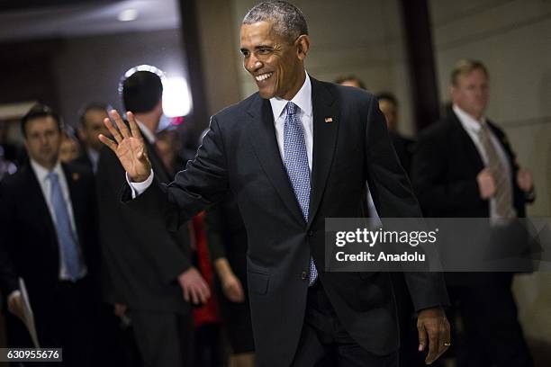 President Barack Obama leaves after meeting with Democratic members of the House and Senate to discuss how to protect the Affordable Care Act from...