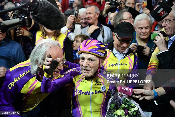 French centenarian cyclist Robert Marchand, 105 reacts after setting a one-hour track cycling World record at 22.547m in the over-105 age group, at...