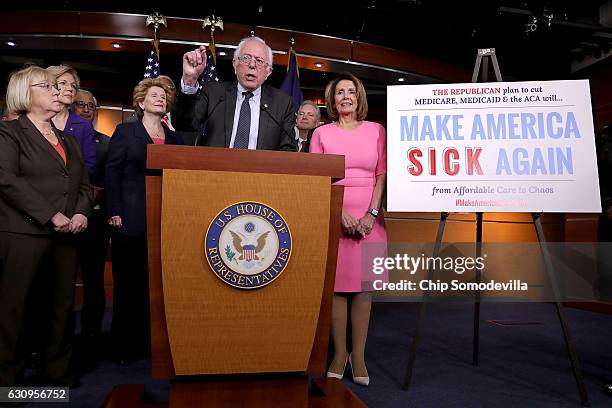 Sen. Bernie Sanders talks to reporters with fellow Democrats from both the House and Senate, including Sen. Patty Murray , Sen. Elizabeth Warren ,...