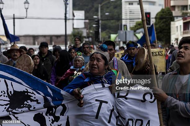 Members of mapuche communities during the demonstration in Temuco, Chile on 4 January 2016. With traditional prayers and a march to mark the 9 years...