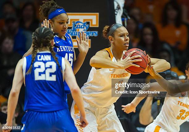 Tennessee Lady Volunteers forward/center Schaquilla Nunn grabs a rebound and fights for position on Kentucky Wildcats center Alyssa Rice during a...