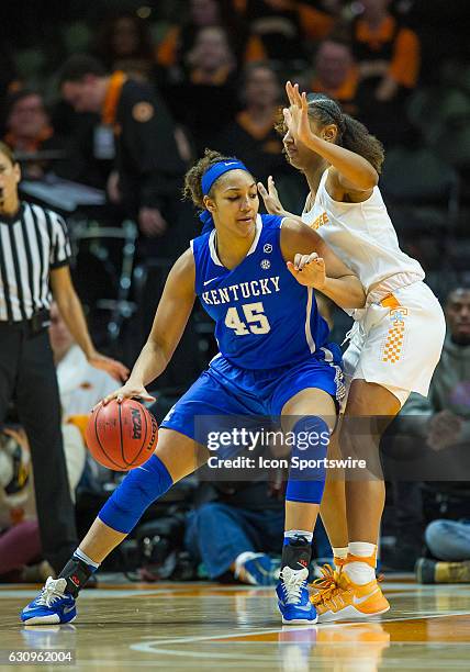 Kentucky Wildcats center Alyssa Rice driving against Tennessee Lady Volunteers guard/forward Jaime Nared during a game between the Tennessee Lady...