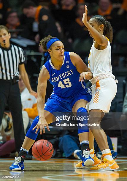 Kentucky Wildcats center Alyssa Rice tries to drive inside against Tennessee Lady Volunteers guard/forward Jaime Nared during a game between the...