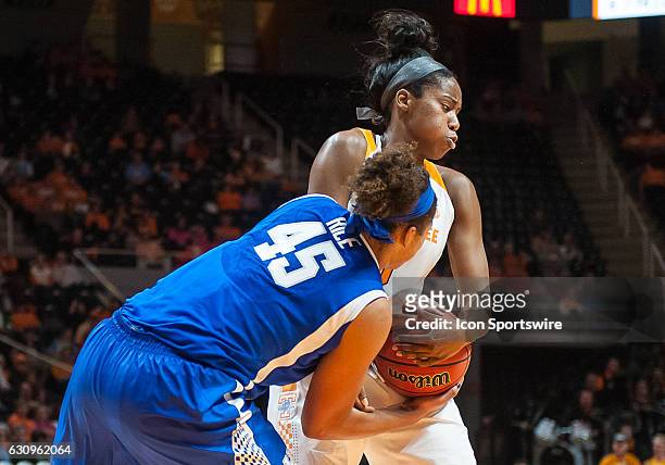 Tennessee Lady Volunteers guard Jordan Reynolds and Kentucky Wildcats center Alyssa Rice fight for a rebound during a game between the Tennessee Lady...
