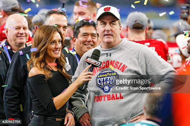 Wisconsin Badgers head coach Paul Chryst is interviewed by ESPN Sideline Reporter Allison Williams after the Goodyear Cotton Bowl Classic between...