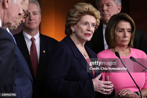 Sen. Debbie Stebenow joins House Minority Leader Nancy Pelosi and fellow Democrats from both the House and Senate for a news conference following a...