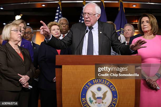 Sen. Bernie Sanders and House Minority Leader Nancy Pelosi join fellow Democrats from both the House and Senate for a news conference following a...