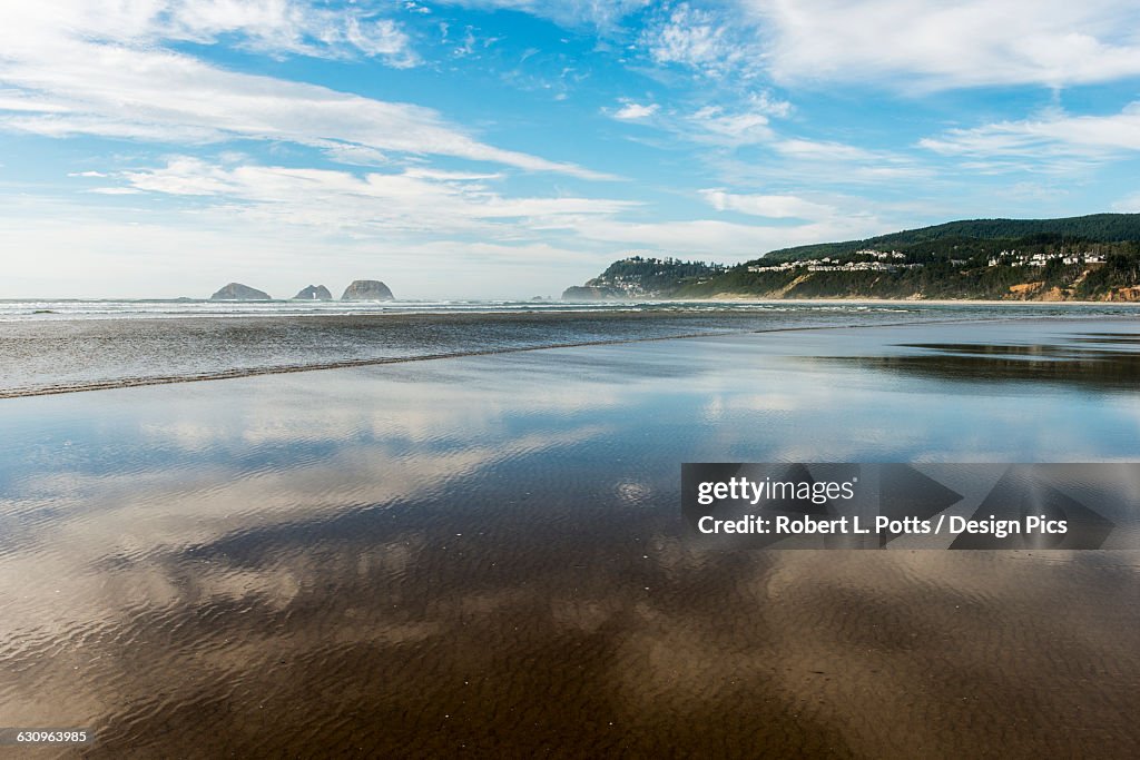 The beach reflects near Netarts Bay on the Oregon Coast