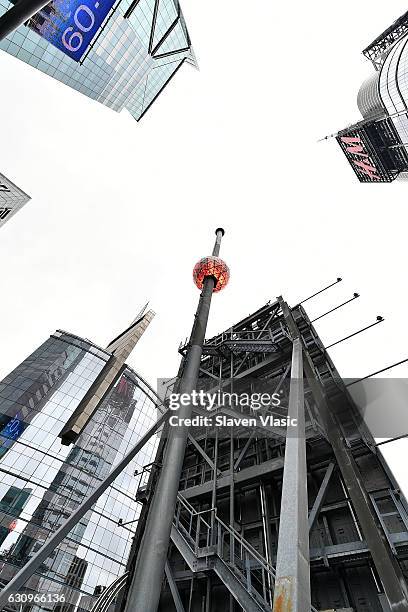 The iconic Times Square New Year's Eve Ball, which dropped to usher in 2017, is once again sent back up the 130-foot pole atop One Times Square,...