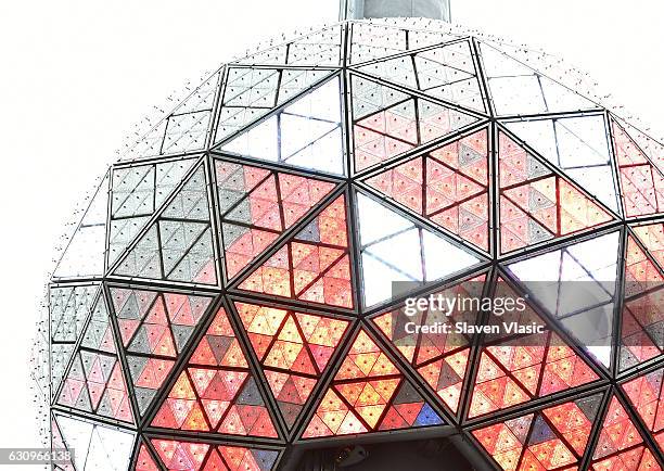 The iconic Times Square New Year's Eve Ball, which dropped to usher in 2017, is once again sent back up the 130-foot pole atop One Times Square,...