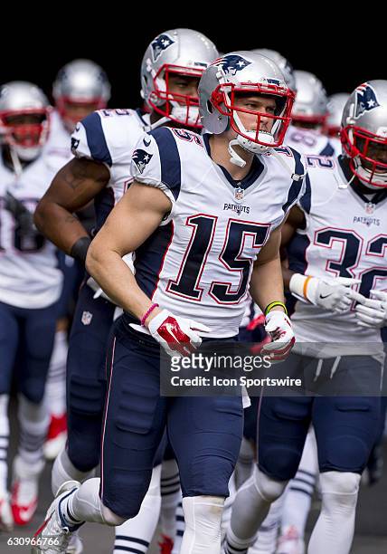 New England Patriots Wide Receiver Chris Hogan runs onto the field during the NFL football game between the New England Patriots and the Miami...