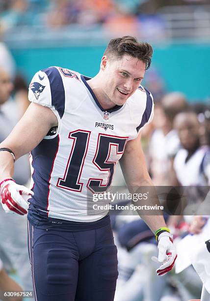 New England Patriots Wide Receiver Chris Hogan smiles on the sidelines during the NFL football game between the New England Patriots and the Miami...