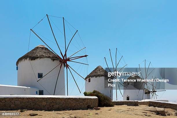 traditional windmills - terence waeland stock-fotos und bilder