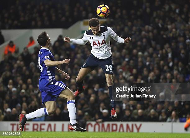 Dele Alli of Tottenham Hotspur scores his sides first goal with a header during the Premier League match between Tottenham Hotspur and Chelsea at...