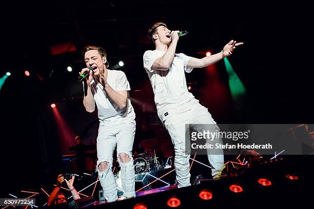 Heiko Lochman and his twin brother Roman of Die Lochis perform live on stage during a concert at Columbiahalle on January 4, 2017 in Berlin, Germany.