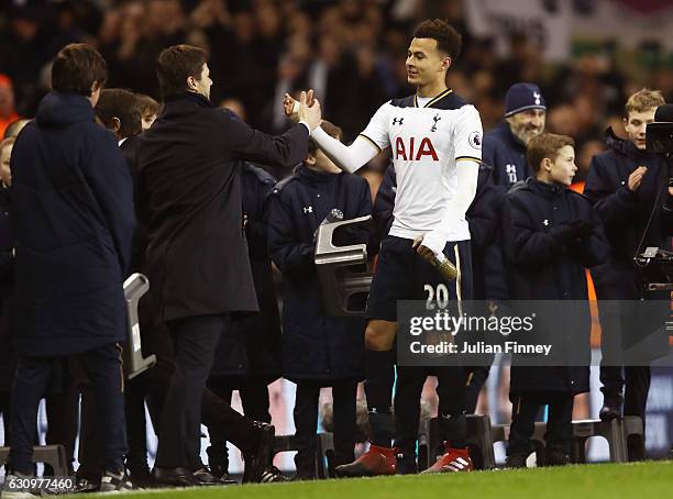 Mauricio Pochettino, Manager of Tottenham Hotspur and Dele Alli of Tottenham Hotspur embrace after the the Premier League match between Tottenham...