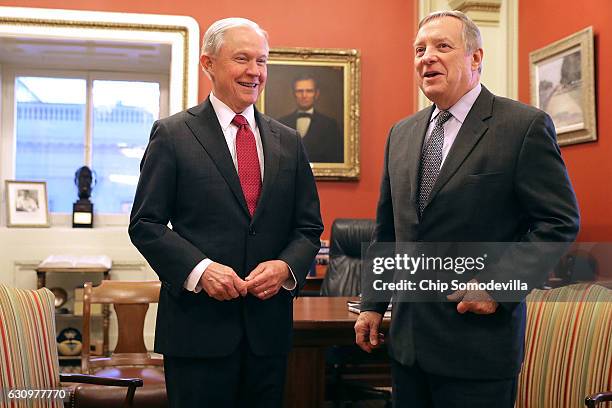 President-elect Donald Trump's choice for Attorney General, Sen. Jeff Sessions poses for photographs with Senate Minority Whip Richard Durbin in his...