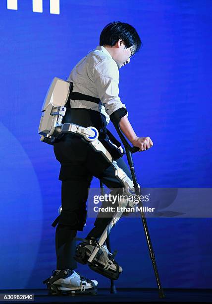 Hyundai Motor Co. Senior engineer Dr. Dong Jin Hyun demonstrates the H-Mex Hyundai Medical Exoskeleton, which is used to assist people who have...