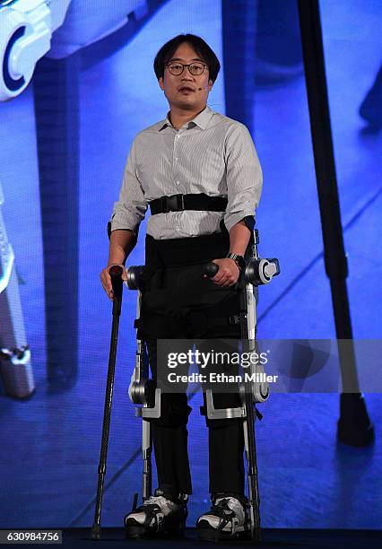 Hyundai Motor Co. Senior engineer Dr. Dong Jin Hyun demonstrates the H-Mex Hyundai Medical Exoskeleton, which is used to assist people who have...