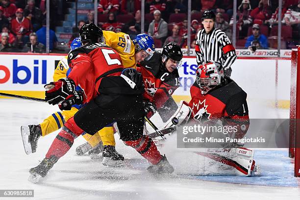 Goaltender Connor Ingram of Team Canada makes a save during the 2017 IIHF World Junior Championship semifinal game against Team Sweden at the Bell...