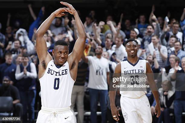 Avery Woodson and Kelan Martin of the Butler Bulldogs celebrate in the closing seconds of the game against the Villanova Wildcats at Hinkle...