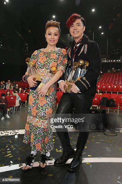 Singer Joey Yung and singer Hins Cheung attend the 39th RTHK Top 10 Chinese Gold Songs Awards on January 4, 2017 in Hong Kong, China.