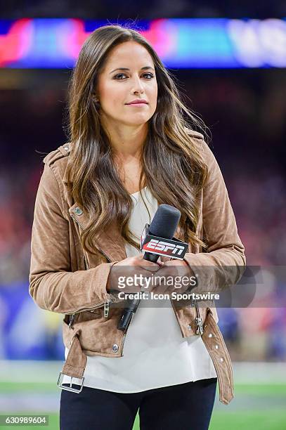 Sideline reporter Kaylee Hartung prepares to open the game for the ESPN TV audience before the Sugar Bowl game between the Auburn Tigers and Oklahoma...