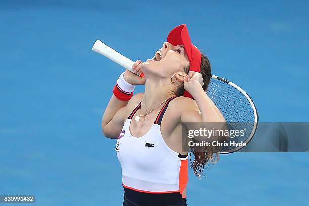 Alize Cornet of France celebrates winning her quarter final match against Dominika Cibulkova of Slovakia during day five of the 2017 Brisbane...