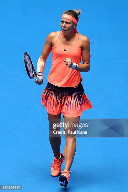 Lucie Hradecka of the Czech Republic celebrates winning a point during the women's singles match against Lara Arruabarrena of Spain on day five of...