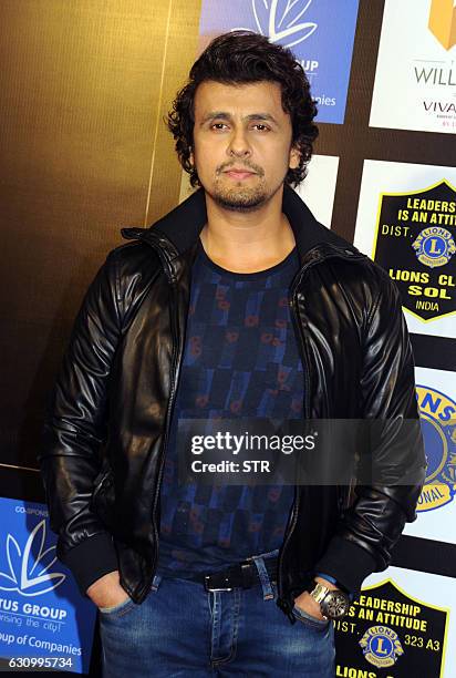 Indian Bollywood playback singer Sonu Nigam poses as he attends the Lions Gold Awards 2016 in Mumbai late January 4, 2017. / AFP / STR