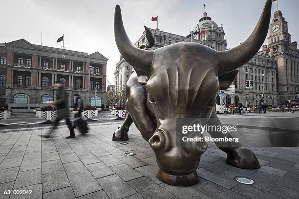 The Bund Bull stands in Shanghai, China, on Wednesday, Jan. 4, 2017. After defying skeptics with solid growth last year, China aims to do the same...