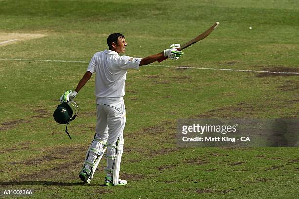 Younis Khan of Pakistan celebrates and acknowledges the crowd after scoring a century during day three of the Third Test match between Australia and...