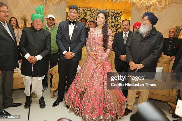 Former Haryana Chief Minister Om Prakash Chautala along with his grandson and MP from Hisar Dushyant Chautala and Meghna Ahlawat, daughter of IPS...