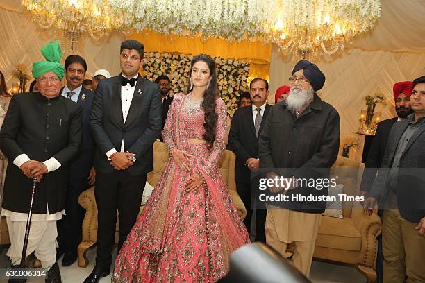 Former Haryana Chief Minister Om Prakash Chautala along with his grandson and MP from Hisar Dushyant Chautala and Meghna Ahlawat, daughter of IPS...