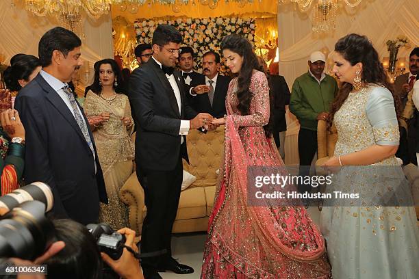 Hisar MP Dushyant Chautala and Meghna Ahlawat, daughter of IPS officer, IGP Paramjeet Ahlawat, during their engagement ceremony, on January 3 in...