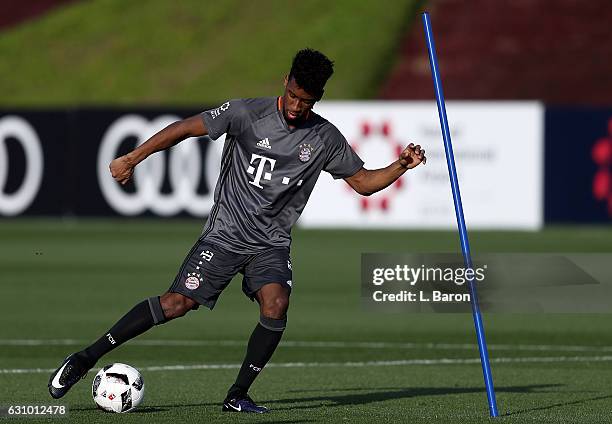 Kingsley Coman kicks a ball during a training session at day 3 of the Bayern Muenchen training camp at Aspire Academy on January 5, 2017 in Doha,...