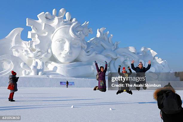 Visitors enjoy at Harbin International Ice and Snow Festival on January 5, 2017 in Harbin, China.