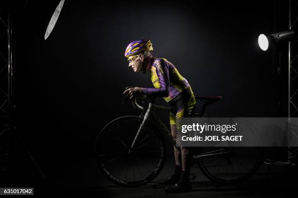 French 105-year-old Robert Marchand poses during a photo session in Paris on January 5 a day after he set a new one-hour cycling record for his age,...