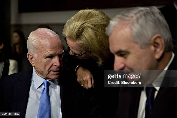 Senator John McCain, a Republican from Arizona and chairman of the Senate Armed Services Committee, from left, speaks with Senator Claire McCaskill,...