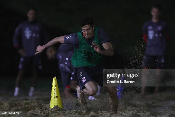 Robert Lewandowski sprints in the sand during a training session at day 3 of the Bayern Muenchen training camp at Aspire Academy on January 5, 2017...