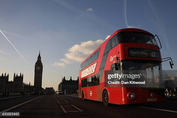 Routemaster bus drives past the Houses of Parliament in Westminster towards Dulwich Library on January 5, 2017 in London, England. TFL, Transport for...