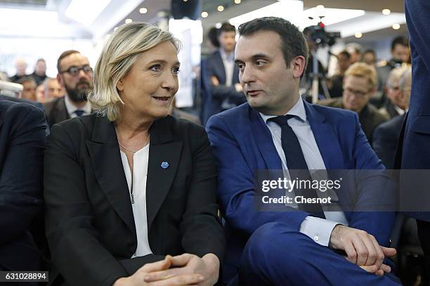 President of French far-right Front National party Marine Le Pen and FN's vice-president Florian Philippot attend a meeting on the theme ''France,...
