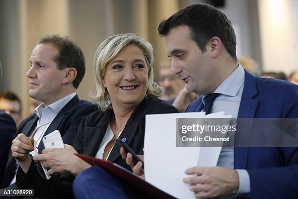 President of French far-right Front National party Marine Le Pen and FN's vice-president Florian Philippot attend a meeting on the theme ''France,...