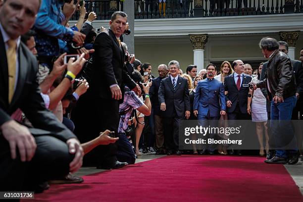 Henry Ramos Allup, former president of the National Assembly, from left, Freddy Guevara, newly appointed first vice president of the National...