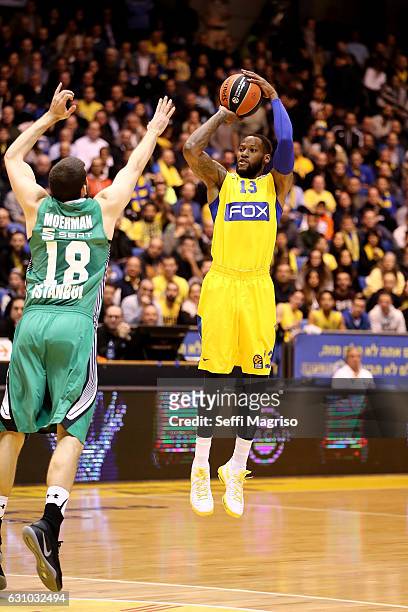 Sonny Weems, #13 of Maccabi Fox Tel Aviv competes with Adrien Moerman, #18 of Darussafaka Dogus Istanbul in action during the 2016/2017 Turkish...