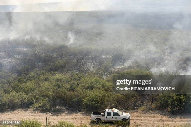 Aerial view of a wildfire in La Adela, La Pampa province, Argentina on January 05, 2017. Firefighters in Argentina are struggling to control a series...