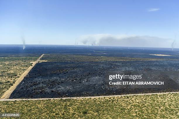 Aerial view of a wildfire in La Adela, La Pampa province, Argentina on January 05, 2017. Firefighters in Argentina are struggling to control a series...