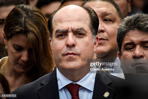 Opposition's parliamentary leader Julio Borges attends the swearing-in ceremony for outgoing assembly speaker Henry Ramos Allup is due to be replaced...